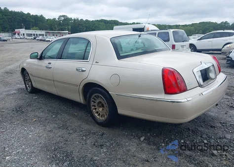 2001 Lincoln Town Car Cartier from USA, damaged, VIN 1LNHM83W71Y629856